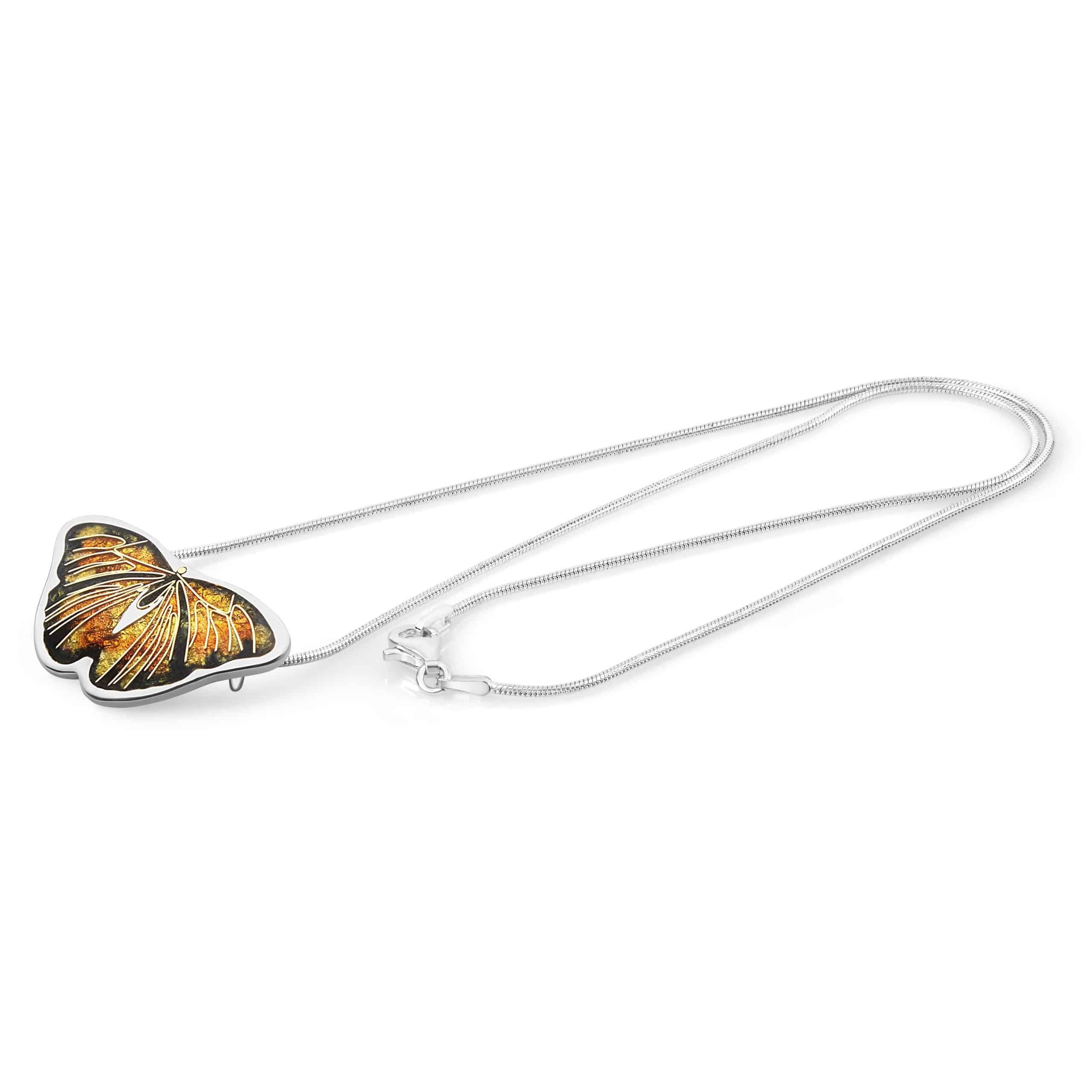 small monarch butterfly pendant made with the cloisonne technique, with a sterling silver chain